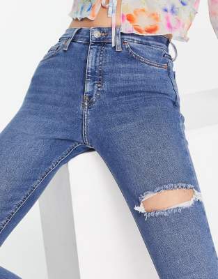 blue ripped topshop jeans