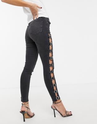 black jeans with buckles