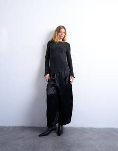 Model wearing Jaquard zebra slash neck long sleeve in black