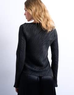 Model wearing Jaquard zebra slash neck long sleeve in black