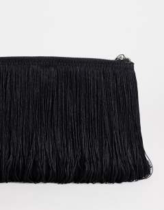 Model wearing Jasmine fringe envelope bag in black
