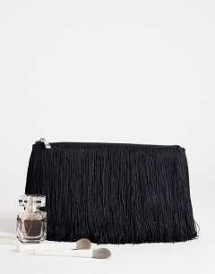 Model wearing Jasmine small fringe envelope bag in black