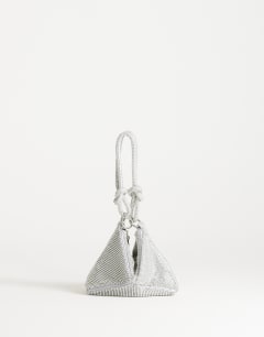 Model wearing Jax embellished asymmetric grab bag in silver