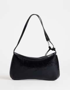 Model wearing Jaye shoulder bag in black