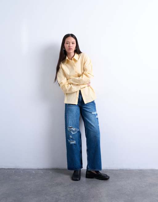 Topshop - Jeans blu medio a vita medio alta con strappi sulle ginocchia
