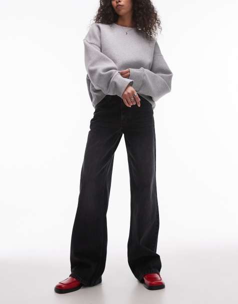 Topshop - Jeans met wijde pijpen en halfhoge taille in zwart met wassing - view 1