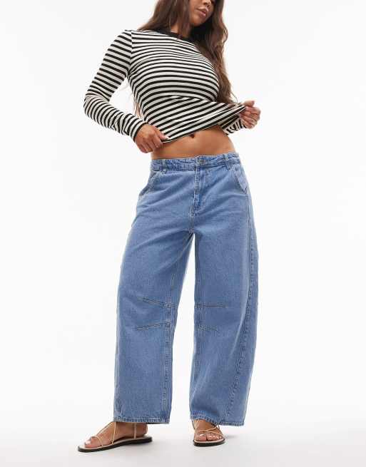 Topshop - Jeans met wijde ronde pijpen en middenhoge taille met zijpaneel in bleekwassing