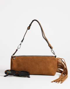 Model wearing Jemma real leather tassel shoulder bag in tan