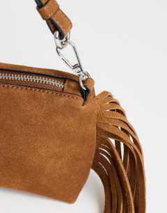 Model wearing Jemma real leather tassel shoulder bag in tan