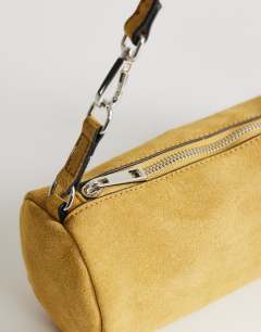Model wearing Jemma small real leather tassel shoulder bag in buttermilk