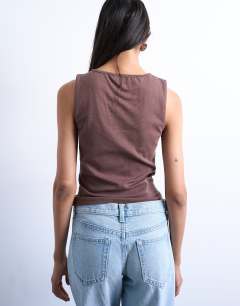 Model wearing Jersey asymmetric button through tank top in chocolate brown