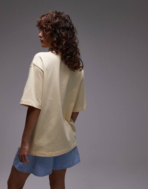 Topshop jersey Biarritz graphic oversized T-shirt in buttermilk yellow