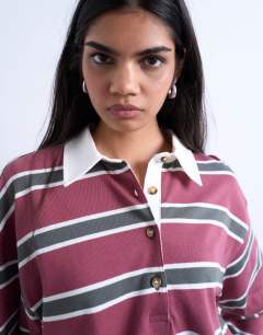 Model wearing Jersey stripe rugby long sleeve polo in burgundy