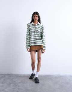Model wearing Jersey stripe rugby long sleeve polo in pistachio