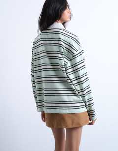 Model wearing Jersey stripe rugby long sleeve polo in pistachio