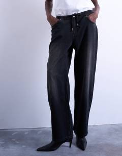 Model wearing Jogger jean with drawcord in washed black
