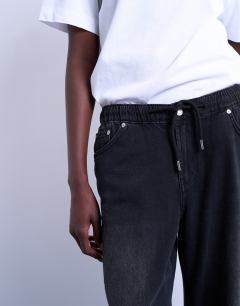 Model wearing Jogger jean with drawcord in washed black