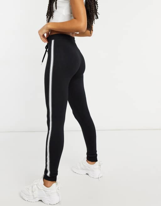 Black jogger with store white stripe