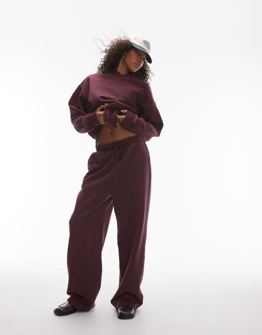 Topshop – Jogginghose in Burgunderrot mit weitem Bein und Acid-Waschung