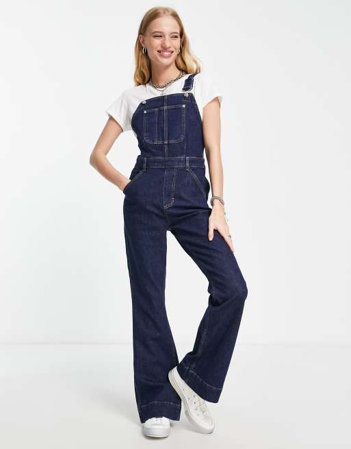 Topshop Joni flare denim jumpsuit in indigo | ASOS