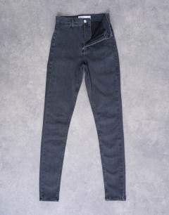 Model wearing Joni high rise super skinny jean in washed black 