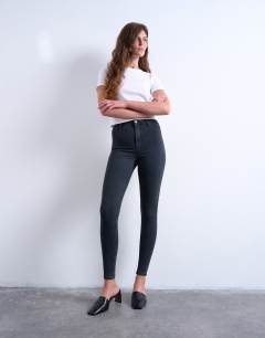 Model wearing Joni high rise super skinny jean in washed black
