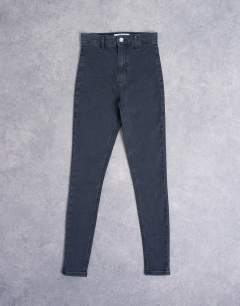 Model wearing Joni high rise super skinny jean in washed black