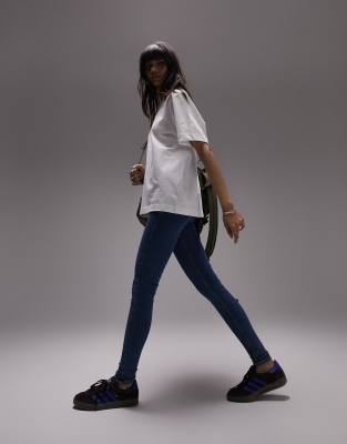 Reclaimed Vintage The '89 slim tapered leg jean in vintage mid stone wash