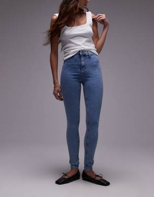 Topshop - Joni - Jeans in Bleich-Waschung mit hohem Bund-Blau