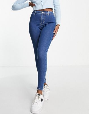 Shop Topshop Joni Jeans In Mid Blue