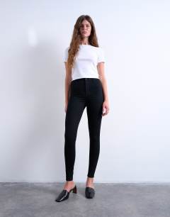 Model wearing Joni skinny high rise jean in black