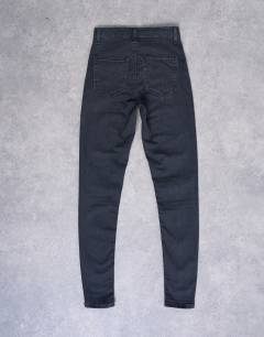 Model wearing Joni skinny high rise jean in washed black