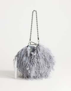 Model wearing Juliet small fringe grab bag in grey