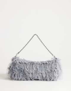 Model wearing Juliet small fringe grab bag in grey