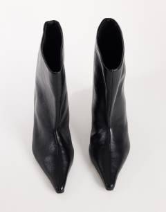 Model wearing Kai super wide heeled ankle boot in black