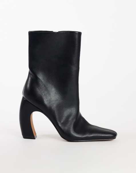 Topshop Karter curved heel ankle boots in black stretch faux leather - view 1