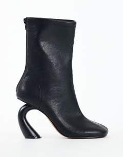 Model wearing Kendal structured heel sock boot in black
