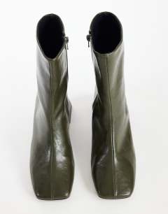 Model wearing Kenton block heel ankle boot in khaki