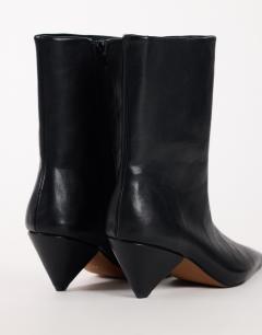 Model wearing Kiki cone heel ankle boot in black