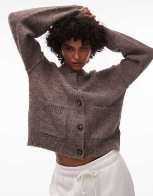 knit exposed seam crew neck cardigan with pockets in brown