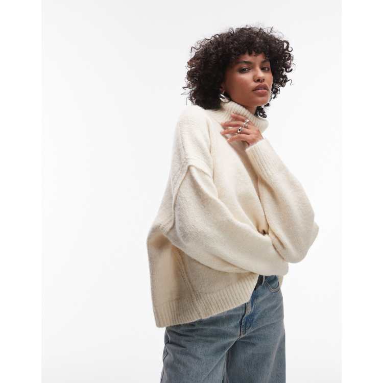 Topshop knit exposed seam turtleneck relaxed sweater in ivory | ASOS