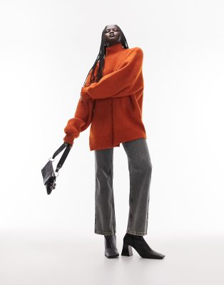 knit funnel neck long line sweater in rust-Orange