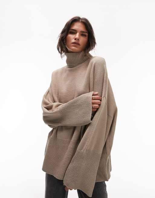 Oversized roll store neck knit jumper