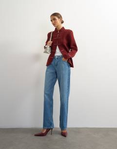 Model wearing Knitted all needle frogging detail jacket in red