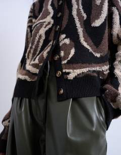 Model wearing Knitted animal pattern cardigan in brown