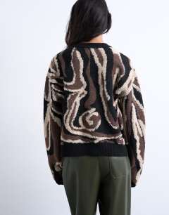 Model wearing Knitted animal pattern cardigan in brown