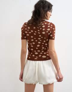 Model wearing Knitted animal print fitted short sleeve t-shirt in brown