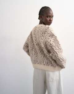 Model wearing Knitted animal spotted print cardigan