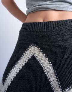 Model wearing Knitted argyle co-ord skirt in charcoal