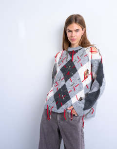 Knitted argyle distressed jumper